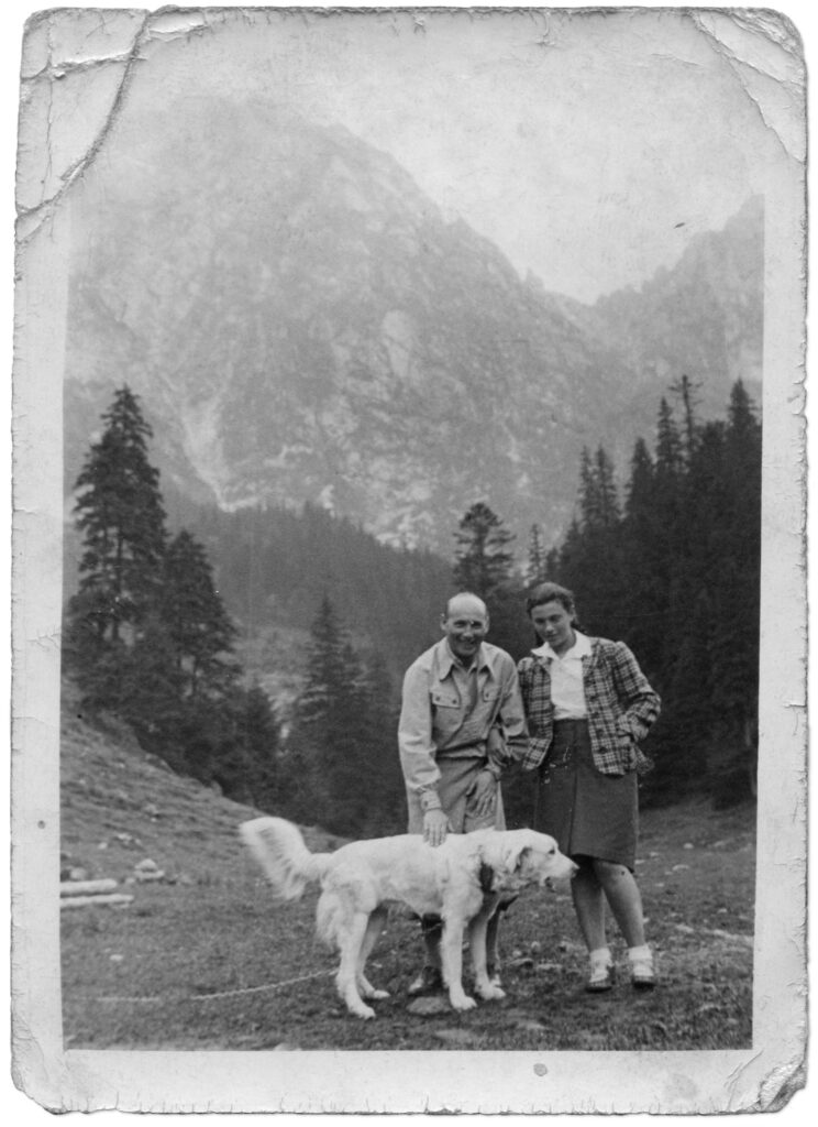 Berta and her stepfather holiday in Zakopane. Posed in the mountains with a dog.